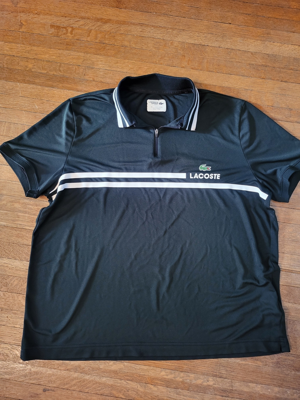 Lacoste Black Polo with White Chest Stripes and Zip Collar